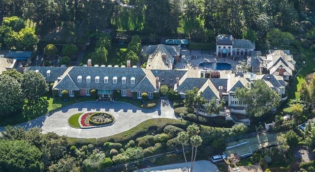 La Jolla's spectacular eight-acre sea-view estate crowning the pinnacle of the Country Club neighborhood, “Foxhill,” offers vast acreage and once-in-a-lifetime opportunity. Gorgeous panoramic ocean and village hillside views are enjoyed from softly sloped areas throughout the vast property of orchards, terraced gardens, expansive lawns and meandering walkways. Exquisitely manicured grounds surround the classic manse including large circular motor court, pool and patio. Please see Supplement. The residence, embracing gardens and pool courtyard areas, is appointed with exquisite handcrafted woodwork, fully paneled library/office, formal dining with hand-painted mural of the property and built-in showcase cabinetry, a full-service professional kitchen with extraordinary china storage and catering capacity, a grand new wing (2012) with lavish design details including Lalique-style bath hardware and windows. Existing outbuildings include guest house, pool pavilion, separate staff's quarters, greenhouse, fitness center/office, garden shed, 12-car garages with lifts, over-garage suites, and entry gatehouse for security personnel. Exquisitely manicured grounds surround the classic manse including large circular motor court, pool and patio, formal orchard garden, terraced vegetable and cutting gardens, and long wooded paths for strolling sea-view lawn and gardens. Adjacent 24 acres are available for expansion.. Neighborhoods: Country Club Equipment: Dryer,Pool/Spa/Equipment, Range/Oven, Washer Other Fees: 0 Sewer: Sewer Connected Topography: LL,GSL Guest House Est. SQFT: 1252