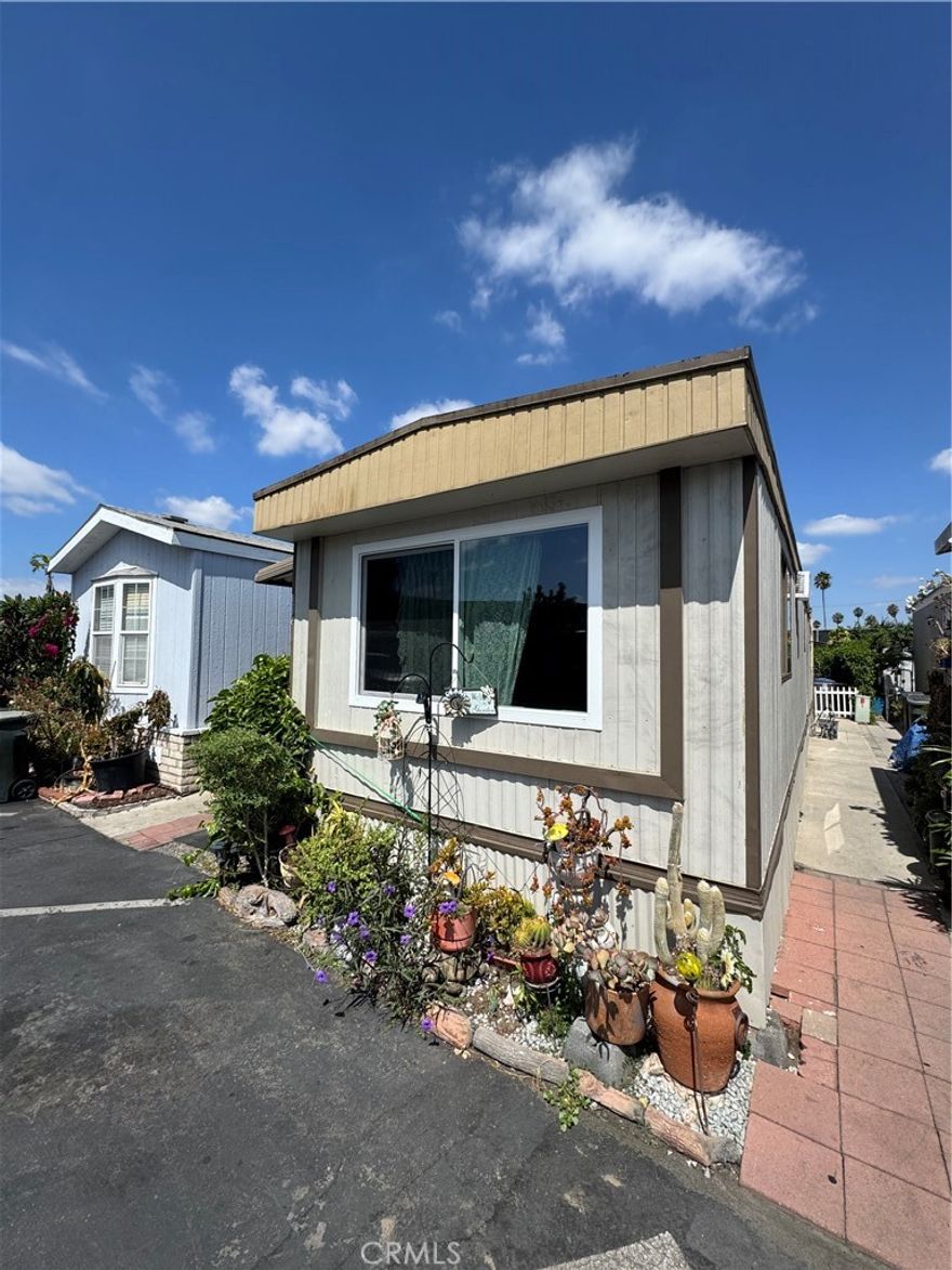 Recently upgraded Mobile home.  – 2 Bed / 1 Bath
Kitchen, Bathroom have been upgraded. Nice Backyard patio.  
Assigned 2 car spaces. Across the Street from Indoor Swapmeet, close to Walmart, Grocery Store and shopping centers. This is a very comfortable and cozy home! Enjoy the benefit of low space rent.