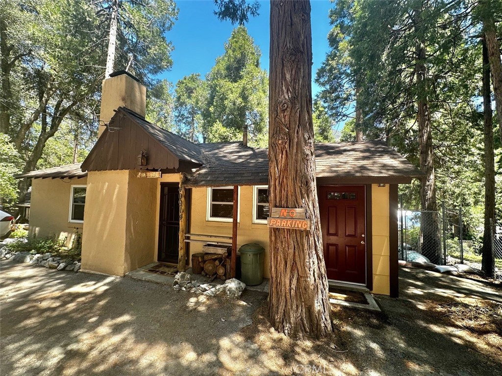 Adorable single level well loved home. Owned by the same family forever, it's time they finally say goodbye and allow someone else to make memories and fall in love with this home! Two bedrooms and one bath separated by a jack and Jill bathroom. Perfect for a full-time or vacation home. Efficient kitchen and attached dining area. Service porch hosts laundry hook ups. Fenced rear yard, has big gate so you can drive to the back if necessary. Big rear deck off kitchen makes for many hours of enjoyable deck time. Fruit trees on rear part of the property. Sitting at the end of a quiet street home is secluded and waits for you to call it your own!