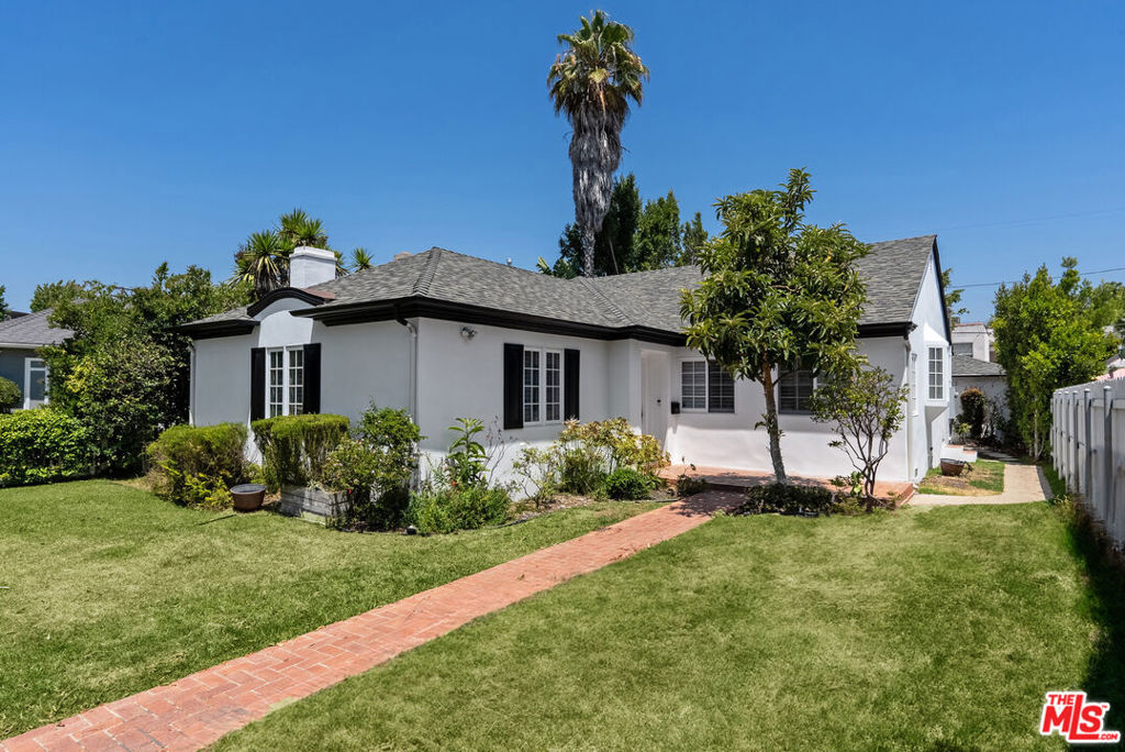 Designer done hip traditional nestled on a beautiful tree-lined street in this highly sought after Beverly Hills adjacent neighborhood. 3 bed 3 bath hi-tech smart home with nest controls, home security & speakers throughout. Master suite with walk-in closet, rustic-modern bathroom & double french doors to backyard. Living room built-in bookshelves & fireplace, stylish dining room, & a fully equipped kitchen with stainless steel appliances, carrara marble countertops and eat-in banquet. Grassy backyard and large grassy front gated lawn. Located just around the corner from Roxbury Park, the newly renovated Century City mall and the world famous shops and restaurants of Beverly Hills.