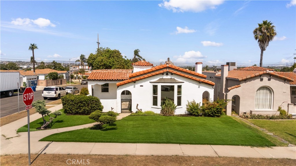 Welcome to this beautifully renovated Spanish home, perched on a generous corner lot in the desirable pocket of Morning-side Park neighborhood. This residence offers three spacious bedrooms, 3-bath, over 1,940 sqft of living space. The moment you step inside, the soaring entryway, high ceilings living room, larger windows creating an airy, welcoming atmosphere. The open-concept floor plan seamlessly connects living room, dinning area, and kitchen. The fully equipped kitchen boasting granite countertops, stainless steel appliances, and ample storage perfect for both everyday living and entertaining. The primary bedroom, nestled at the back of the house for added privacy, features a luxurious en suite bath with a walk-in closet. All the bedrooms are spacious, plus two of them with en-suite bath. On top of the great size main residence, a bonus room attached to the garage adds versatile space, ideal for an office, studio, additional storage or potential ADU! The possibilities are endless! Step outside, the backyard is designed for low maintenance while the front yard offers fresh landscaping with artificial turf. This move-in ready home boasts brand-new flooring, new windows, smooth ceilings with recessed lighting, and fresh paint throughout. The neighborhood is known for its pride of ownership and offers convenient access to nearby shopping, dining, and everyday essentials, along with SoFi Stadium, Intuit Dome, Hollywood Park, the 2028 Olympics venues, and new entertainment destinations. Price to sell! Schedule your private showing today.