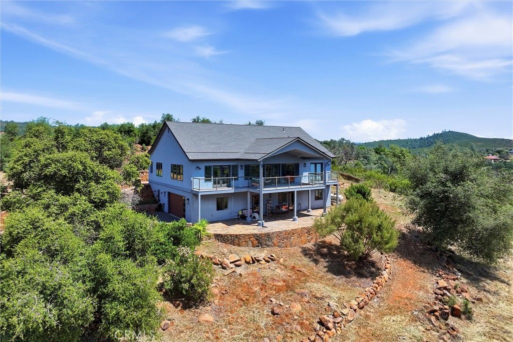 Photo of 20069 Honey Hill Dr, Hidden Valley Lake, CA 95467 (MLS # LC26093705)