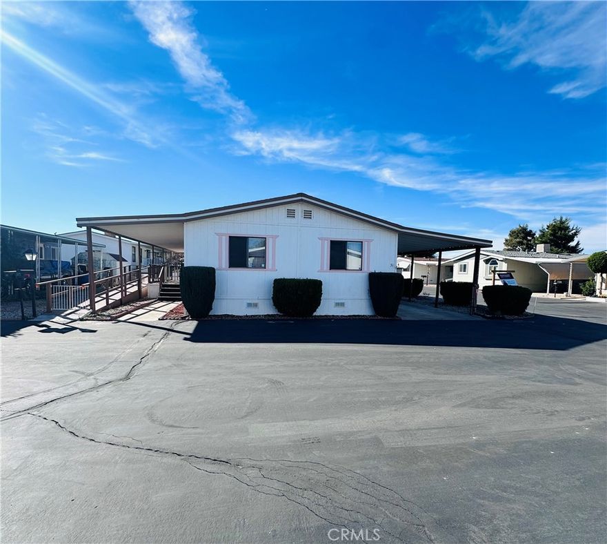 Welcome home to this spacious 3-bedroom, 2-bath manufactured home offering 1,344 square feet of comfortable living in the lovely 55+ community of The Seasons in Victorville. From the moment you step inside, you’ll appreciate the bright, open layout and the sense of space this home provides. The living room is inviting and filled with natural light, creating a warm and relaxing atmosphere. The kitchen offers generous counter space, abundant cabinetry, and a convenient layout that makes cooking and entertaining a joy. Adjacent to the kitchen, the dining area is perfect for both everyday meals and gatherings with family and friends.



The primary suite is a peaceful retreat with its own private bath and ample closet space. The additional bedrooms are well-sized and versatile—ideal for guests, an office, or a hobby room.



Outside, you’ll find a low-maintenance yard and covered parking, providing convenience and space to enjoy the outdoors.



Located in The Seasons, a quiet, well-kept 55+ community, residents enjoy access to amenities such as a community pool, clubhouse, and more. The neighborhood is peaceful yet perfectly situated—just minutes from grocery stores, restaurants, shopping, and easy highway access, making daily living simple and stress-free.



This is your chance to own a spacious, affordable home in a fantastic Victorville location. Don’t miss out—schedule a showing today and experience all that this charming property has to offer!