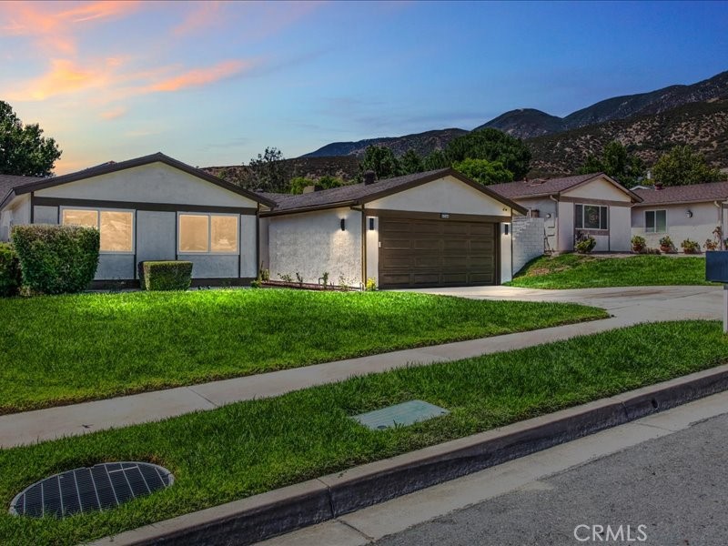 Welcome to this beautifully updated 4-bedroom, 2-bathroom home just minutes from California State University, San Bernardino. Step inside to an open and inviting layout with luxury vinyl flooring and recessed lighting that creates a bright, modern atmosphere. The kitchen features quartz countertops, soft-close cabinetry, and plenty of storage—perfect for daily living and entertaining. Both bathrooms are upgraded with clean, contemporary finishes for a fresh and comfortable feel. All four bedrooms offer generous space, making this home ideal for families, students, or anyone needing a home office or guest room. The private backyard is ready for outdoor gatherings or peaceful relaxation. Located near parks, shopping, dining, and with easy freeway access, this home is a fantastic opportunity you won’t want to miss.