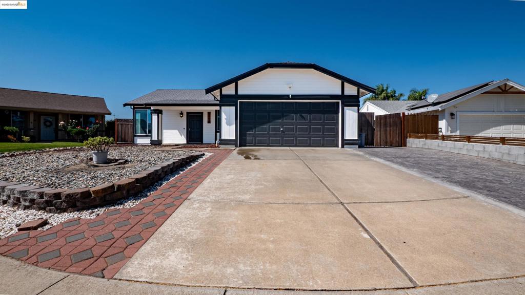 Welcome to this ranch style home in Oakley! This home features plenty of modern updates such as marble countertops in the kitchen and bathroom,, stainless steel appliances, and contemporary cabinets. Classic hardwood flooring throughout the living areas. Modern electric fireplace with finely crafted wood mantle that features a access panel to plug in wall mounted television and speakers. Fully equipped contemporary laundry room with modern shelving. Beautiful new roof only 4 years old. The sliding door to the back yard opens to an impressive patio that has an amazing cover which has two outdoor ceiling fans and lighting; plenty of room to entertain out there! Huge backyard. RV parking at the side of the house. Schools, restaurants and stores all nearby.