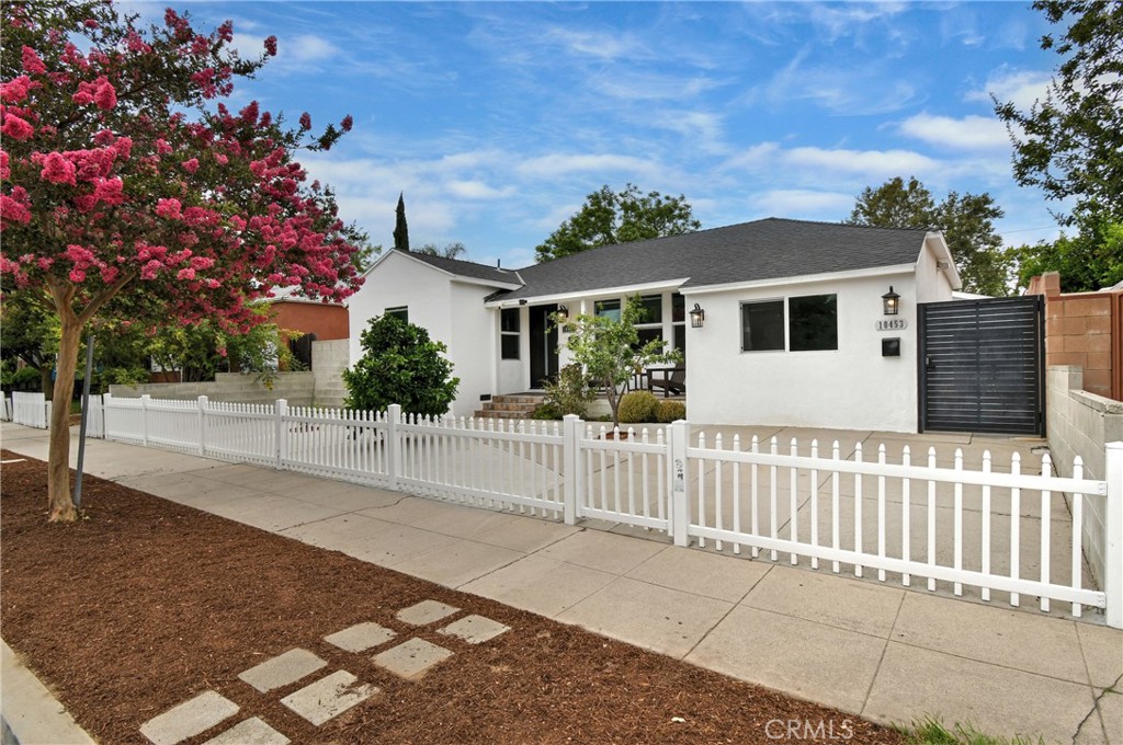 Great Location – Incredible Opportunity!
This beautifully updated 3-bedroom, 2-bath home (1,845 sq ft) plus a fully permitted ADU with separate address (10453 Chandler) 342 sq ft, with a total of 2200 square feet) offers comfort, convenience, and income potential. Ideally situated across from a designated bike path and close to the Metro, this property provides easy access to NoHo, major studios, and local restaurants. The main home was thoughtfully renovated in 2020 with numerous upgrades, including newer dual-pane windows, a 200-amp electrical panel, new roof, and a stunning kitchen featuring quartz countertops, modern cabinetry, and stainless steel appliances. Additional highlights include recessed lighting, new flooring throughout, updated bathrooms, and a powerful 4-ton HVAC system with all new ductwork.
A sleek electric gate leads to a driveway with space for three cars. The detached, permitted ADU has its own address—perfect for additional guests. It boasts stainless steel appliances, a washer and dryer, tankless water heater, and a mini split-unit for efficient heating and cooling.
Don’t miss this turnkey property offering versatility, modern upgrades, and a prime location!