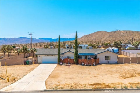 Photo of 58583 Buena Vista Drive, Yucca Valley, CA 92284 (MLS # JT26225558)