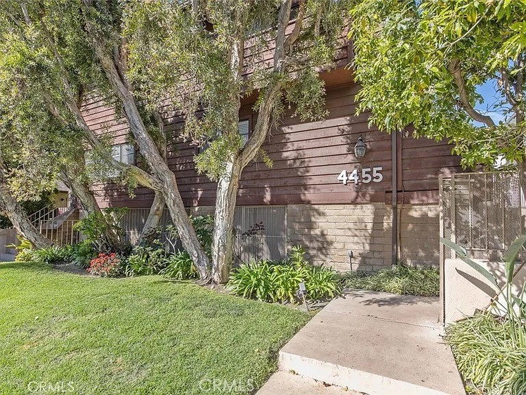 Exquisitely remodeled and bright 2-bed 2.5-bath two story townhome, located in a small and peaceful complex in one of the most coveted neighborhoods of Sherman Oaks! Featuring a fully remodeled chef's kitchen with stainless steel appliances, a large farmhouse style sink, built in water purifier and stylish backsplash. The living room boasts a modern and recently remodeled gas fireplace with floor to ceiling stonework, as well as direct access to a west facing patio. The kitchen features a pass through cutout to the dining area, complete with an elegant chandelier above. The remodeled half bathroom is conveniently located downstairs as well. Upstairs features a large master suite with walk-in closet and a elegantly designed en suite bathroom with dual sinks, gorgeous quartz tile and an oversized shower. The second bedroom is good sized and also features an en suite remodeled bathroom with a shower over tub. The side by said laundry machines are conveniently located in the upstairs hallway and come included. With multiple storage closets, this unit boasts tons of storage space throughout. Other features include a smart Nest thermostat, plantation shutters, recessed lighting and lots of natural light. Two parking spot plus a storage unit in the garage. This property is conveniently located a mile form San Fernando Valley's premier dining and shopping destinations on Ventura Blvd, i.e. Kaiju Sushi, Casa Vega, The Great Greek, and many many more. Available now.