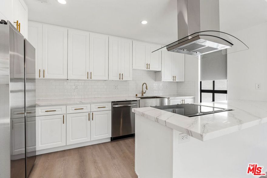 This newly remodeled 1 Bedroom & 2 Bathroom unit at 9191 Charleville blends style and convenience in the heart of Beverly Hills. This residence features an open living & dining area that flows to a private balcony perfect for morning coffee or an evening unwind. A designer kitchen showcases all-new cabinetry and stainless appliances, complemented by new flooring throughout, in-unit laundry, and two beautifully redone bathrooms. Enjoy exceptional walkability just moments to the acclaimed South Beverly Drive dining and retail corridor. Central BH living, turnkey and effortless.