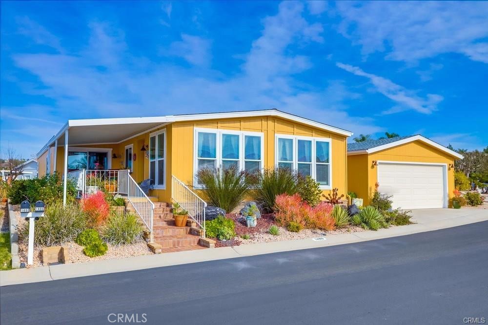 55+ Senior Community- Welcome to your new home at 1486 Puritan Way! Over 1900 sqft 2-bedroom, 2-bath home! This rare TRIPLE-wide residence includes a family room, living room, dining room, laundry room, private patio, and 2-car garage. The open-concept layout provides both comfort and functionality. Located in a well-maintained 55+ community offering fantastic amenities: Community Pool & Spa, Clubhouse with Planned Activities, Convenient Location Close to Shopping, Dining & Medical Facilities