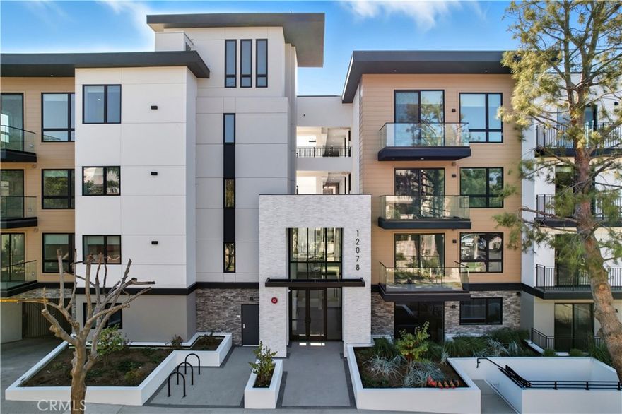 Welcome to Studio City’s Newest Luxury Residence!

Experience refined living in this stunning brand-new building offering villa-inspired residences with designer craftsmanship and sophisticated finishes throughout. This spacious two-level townhouse features dramatic high ceilings, abundant natural light, and a private balcony or patio that seamlessly connects indoor and outdoor living. The thoughtfully designed floor plan offers the bedroom on the lower level for added privacy and a natural separation of space.

Step inside to discover a gourmet kitchen with sleek stone countertops, a large counter, and premium stainless-steel appliances, ideal for both entertaining and everyday enjoyment. Designer bathrooms feature modern tilework and walk-in showers, while wide-plank white oak flooring and oversized windows add warmth and sophistication throughout.

Enjoy boutique-style amenities that enhance your lifestyle, including secure ButterflyMX entry, a fitness center, a co-working lounge with Wi-Fi, Amazon package lockers, EV charging stations, and gated garage parking. Elevator access and security cameras throughout the property ensure both comfort and peace of mind.

Perfectly located in the heart of Studio City, you’ll be just moments from Ventura Boulevard’s best dining, shopping, and cafés, with easy access to CBS and Universal Studios, the 101 and 405 freeways, and nearby favorites like Trader Joe’s, Erewhon, and Whole Foods. The Studio City Farmers Market is just a short stroll away.

Modern design, luxury finishes, and prime location - welcome home to the ultimate Studio City lifestyle.