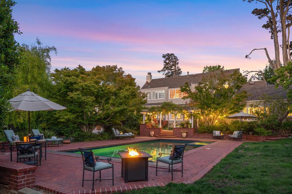 Nestled on a rare, expansive .61-acre level lot in San Mateo Park, this superb offering is a masterpiece of design & luxury living. Boasting 6 bdrms, 4.5 baths & an impressive 4,000+/- sq ft of living space, this stunning home redefines modern elegance.The kitchen features opulent granite countertops, dual ovens, high-end appliances & spacious island. The family room is beautiful w/ marble surround fireplace, built-in shelves & bay window seating, French doors open to the yard. Two ensuite bedrooms on the main floor, including a spacious master with walk-in closet & lavish bathroom. Expansive living room with fireplace & outdoor access, adjacent to a formal dining room. This rare offering provides incredible privacy: elongated drive, a lush lawn, inviting pool, built-in BBQ & patios. Extras include a wine cellar, recreation room, dog run & more. Ideally situated between the downtowns of Burlingame & San Mateo, residents have the luxury of strolling to fine dining & boutique shopping.