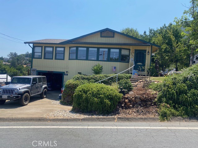 Lakeview, scenic view from home, quiet neighborhood for this 2 bedroom, 2 bathroom. Extras include landscaped front, rear and back yard, covered patio, built in BBQ, fenced yard. Also included with house, additional parcel total 12,000 plus square footage to use to park RV’s, boats, or also possible ADU location. House has an open floor plan, country kitchen with beautiful views of the lake, new HVAC, new roof, new exterior paint, bamboo flooring, and lots of extras!