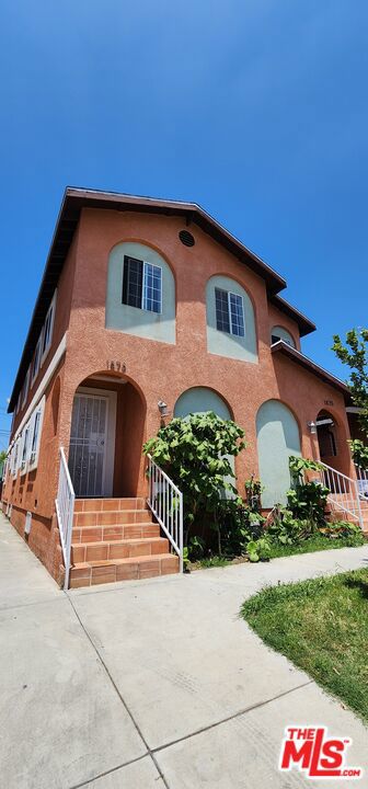 Excellent investment opportunity in a strong rental market! This well-maintained duplex offers two spacious units, each featuring 4 bedrooms and 2 bathrooms. Thoughtfully updated with dual-pane windows, recessed lighting, crown moldings, and modern finishes throughout, the property blends comfort with durability for long-term tenants. A carport with parking for 4 cars adds convenience and value.Located in a high-demand rental area under non rent control, the property provides stable occupancy and consistent rental income potential. Just minutes from USC, Exposition Park, the Coliseum, Banc of California Stadium, Downtown LA, and the Expo Line, tenants enjoy easy access to education, employment, entertainment, and transit. The neighborhood continues to benefit from ongoing development and revitalization, making this a smart long-term investment.Whether you're an owner-user or investor, 1873 Jefferson Blvd is a rare opportunity to secure a property with both size and income potential in the heart of Los Angeles.