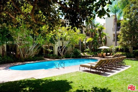 Photo of 555 S Barrington Avenue #211, Los Angeles, CA 90049 (MLS # 26655769)