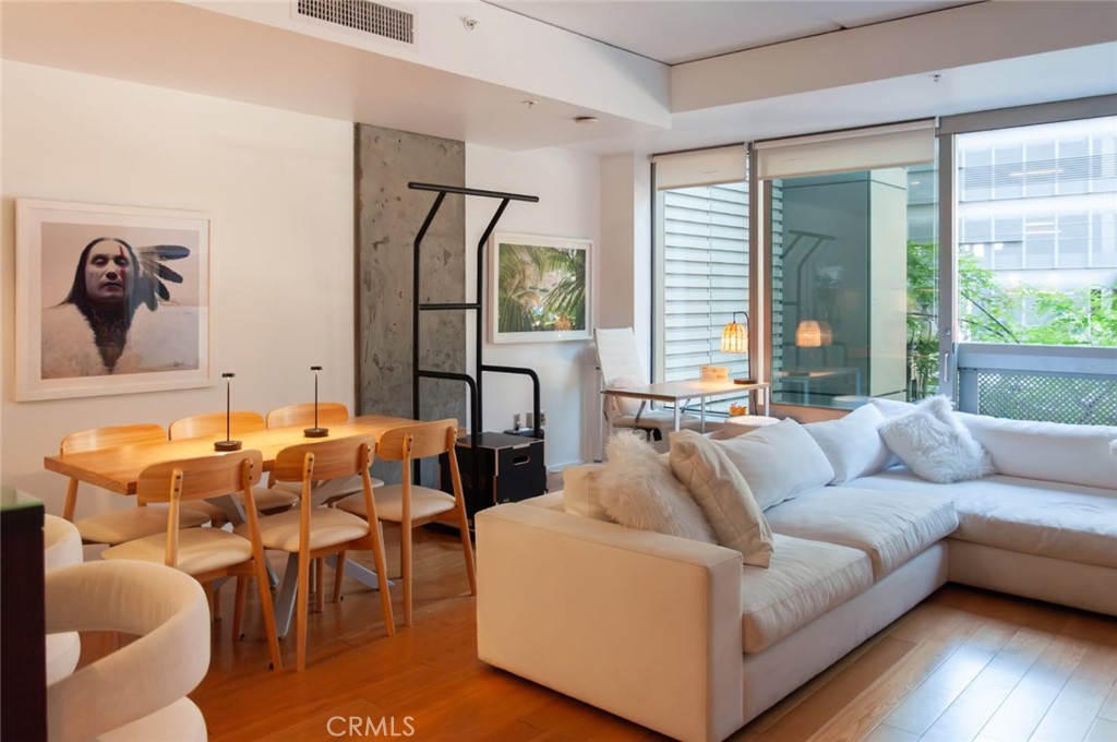 Welcome to the luxurious heart of Downtown L.A.! Come check out this beautiful decked out prestigious bright and spacious one bedroom EVO loft! Beautiful wood floors deck this high-end loft equipped with a European style galley/corridor kitchen layout along with quartz counter tops and stainless steel appliances.
The EVO lofts boast a 24 story full service pristine high rise tower with MANY amenities and services. These resort style amenities range from a residence lounge to a high rise pool and spa, to outdoor TVs, BBQ grills, a fitness center with city views, 24 hour security with a full service concierge, and many more personalized services.
EVO lofts is the premier loft tower in downtown Los Angeles and was even featured in a National Geographic documentary as one of the marvels of high rise construction. These Lofts were developed by The South Group who are known for their luxury loft-style residences. This downtown Los Angeles destination landmark is walking distance to L.A. Live restaurants, entertainment, and shopping, so hurry up and hop on this opportunity as THIS LOFT WILL NOT LAST!