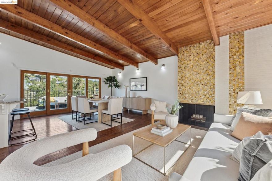 New price! This serene Upper Piedmont home has mid-century style, looking out to wide views of the hills and opposite, to tree-centered garden views through floor-to-ceiling windows & glimpses of the Bay beyond. The upper deck offers a second dining & entertainment space through double sliding doors. To the north, Berkeley’s Campanile tower stands out. Wall-to-wall windows brighten the kitchen, complete with a new free-standing range with air fryer. A breakfast bar expands the open floor plan. Two bedrooms & a stylish bath complete this level with one bedroom facing the front garden through a wall of windows, a great option for a home office. Downstairs, the primary suite with private deck and stunning bath create a beautiful retreat, complete with room for an office, hobbies or just relax. The fourth bedroom w/ ensuite bath & laundry are on the other side of the hall. Previously approved plans to expand & remodel this home are also available. This peaceful setting is just uphill from the center of Piedmont, its schools, parks and community centers. Highly-rated Piedmont Ave restaurants and College Ave with shops, restaurants & Rockridge BART. UC Berkeley, regional parks are nearby while buses & freeways connect easily to the wider San Francisco Bay Area. Come for a visit!