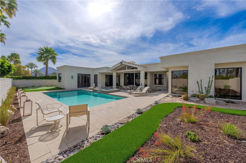 Heaven on earth! Available for the 2025-2026 Season. Relax, unwind and reset in this serene, meticulously upgraded Ironwood Heights home. Nearly 3600 square feet with wood and marble flooring, upgraded fixtures, lighting, finishes, furnishings, artwork, landscape and putting green. The sumptuous main suite is on its own wing of the house with a large bathroom, huge walk-in closet and private office with mountain views. Two other bedrooms and baths are well distanced to allow for maximum privacy for your guests. The great room offers soaring ceilings, a bar set to make memories, adjacent dining room and massive Fleetwood sliders out to the patio, pool, spa and putting green. Drive a Tesla or other EV? We have a charger for you! Live, work, play.. This home is truly the place to exhale and enjoy your best life. Located in the heart of everything...close to The Living Desert, hiking, biking and all the sought after shops, restaurants and galleries on El Paseo. Membership at Ironwood CC is not included with the lease. Please, no pets, no smoking. The owner has allergies. Available November 2025 through March 2026 (and possibly the first week or two of April). A three month minimum is required during the Season. Thank you