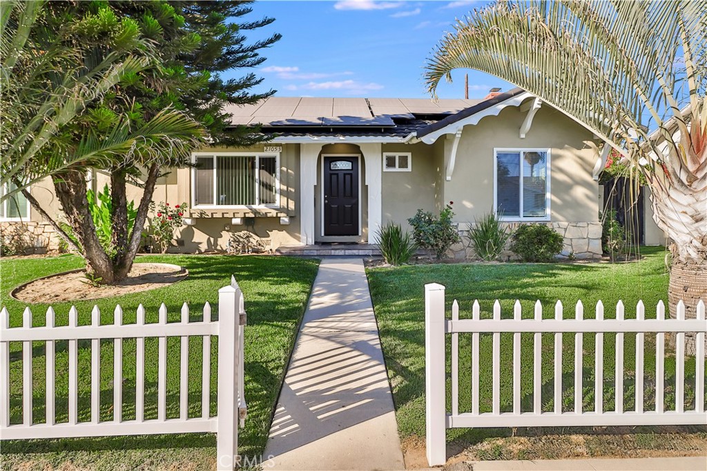 WELCOME TO YOUR NEW DREAM HOME, MOVE IN READY! EV CHARGER, SOLAR, AND MUCH MUCH MORE! This home was completely remodeled & UPDATED IN AND OUT. Showing from the amazing curb appeal and pride of ownership. This home has over 20 solar panels to help with utilities. From the very open light/bright floor plan, that looks and feels much larger, featuring 3 spacious bedrooms/ 2 full baths (master bedroom with attached ensuite). This house does not look, or smell like a rental home. Huge Family Room, living room, large eating area in kitchen, spacious rear yard (very private) with large patio cover, extra storage, newer central A/C and ducts, newer electrical panel, new washer & dryer hook ups, new switches, plugs, fixtures, new interior and exterior led lights, new tankless water heater, full copper plumbing, new windows, new blinds and new doors , new paint in & out, new custom kitchen cabinets and quartz counters with breakfast bar, new appliances, new flooring throughout, new closet doors with mirrors, all bedrooms have large closets, new LED recessed lights throughout home, smooth ceilings, new sprinkler system, All bathrooms have been remodeled/updated and look amazing. Rear gated yard is very private with a large covered patio to enjoy, this is a must see home and is move in ready. THIS WILL NOT LAST COME MAKE THIS HOUSE YOUR HOME TODAY!