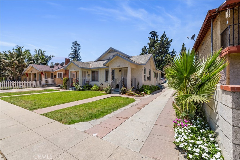 Welcome to 228, 230, 228½, and 230½ S. 4th Street in the heart of Santa Paula — an exceptional multi-unit investment opportunity perfect for both seasoned investors and those looking to expand their real estate portfolio. This unique property features two duplexes situated on one lot, offering a total of four income-generating units and a combined 1,924 square feet of living space. The front duplex consists of two spacious 1-bedroom, 1-bathroom units, ideal for long-term tenants seeking comfort and convenience. At the rear of the property, you'll find two bachelor units located above four detached garages, maximizing use of space and providing additional rental income. Each unit is currently occupied by reliable, long-term tenants, making this a truly turnkey investment with strong cash flow from day one. In addition to its current income-producing setup, this property offers tremendous upside potential. With a generous lot size and favorable layout, there’s a major opportunity to add square footage or build an Accessory Dwelling Unit (ADU) — expanding your rental income and increasing the overall value of the property. Whether you're interested in redevelopment, increasing rental yields, or simply securing a well-maintained asset in a desirable area, this property checks all the boxes. Don’t miss out on this rare chance to own a versatile and high-potential property in the charming and centrally located community of Santa Paula.
