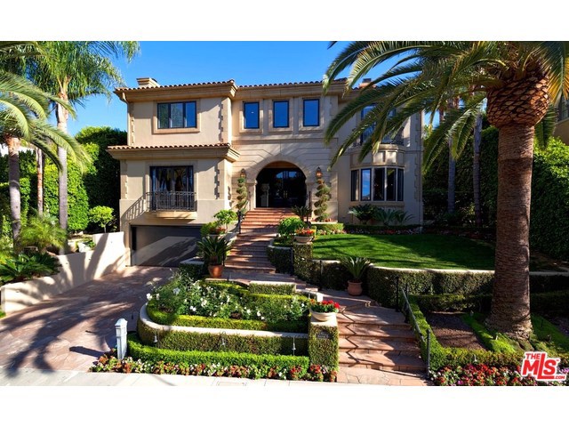 Classically elegant w/ dramatic architectural touches & magnificent elements of design. Grand marble foyer w/ sweeping staircase bids welcome into this 3-story estate. An entertainer's home w/ a seamless flow to this voluminous floor plan. A touch of panache in the gourmet kitchen w/ a duo of elegant chandeliers, gleaming granite, travertine & stainless steel appliances. Casual & formal dining rooms. Wood-paneled media/library room & executive office w/ fireplace, wet bar. 2 separate lavish spa baths in spectacular master suite w/ luminous marble, tile. Indoor-outdoor lifestyle completed w/ flagstone entertainment patios, luxurious pool & spa, cook station,, lush tropical landscaping. Entertainment pavilion w/ fireplace, misting, heating, surround sound systems. Other features include 5-zone A/C & heat. . Public records shows 7,521 square feet of Living space and appraisal shows report shows 9.089 square feet. Buyer to verify.