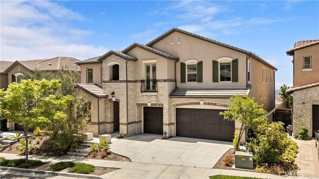Stunning sunset views of a big house in the gated community Oaks of Portola hills. This home is the most desired floor plan 8 with 5 bedrooms 4.5 baths and three cars garage. One big suite downstairs. On the second floor: the Master bedroom has a huge balcony with a breathtaking sunset view. Plus A Big loft and 3 bedrooms. Top builder upgrades came with the best quality. Best price value in the whole area. Huge back yard with city lights view, you can add a pool and Spa to enjoy sunset view every day!