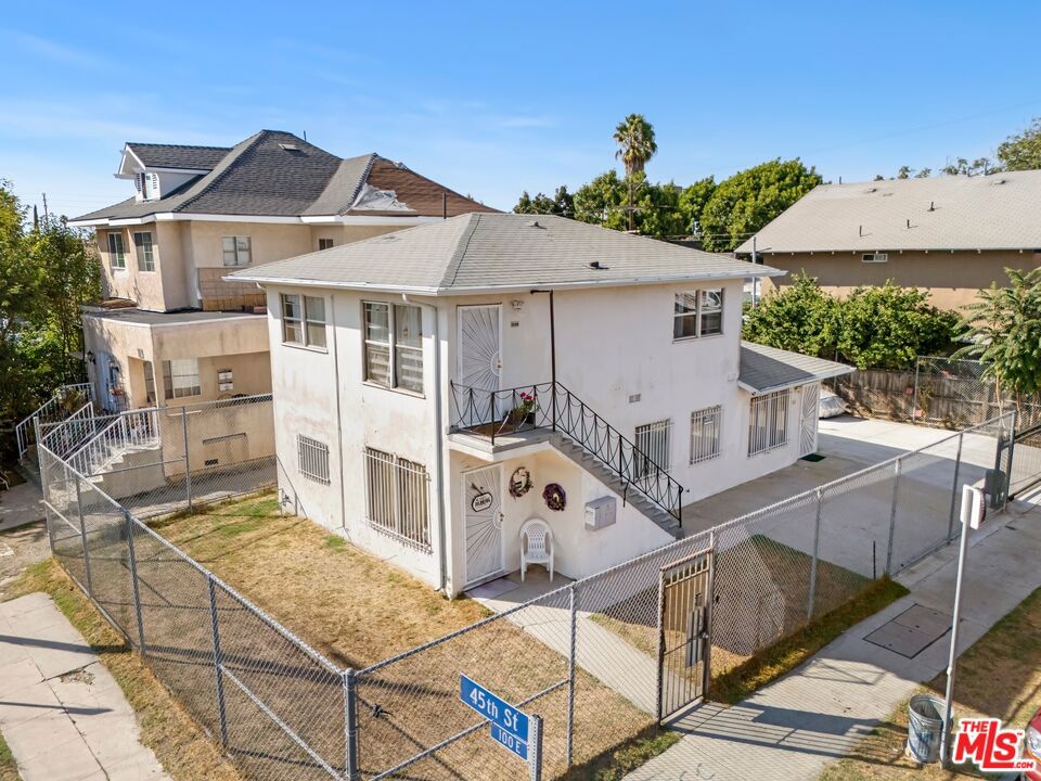 4421 Wall Street is a well-maintained triplex that blends modern upgrades with flexible ownership potential. Located minutes from Downtown Los Angeles, USC, the Coliseum, and LA Live, the property offers tenants a central address with convenient access to major job centers, schools, and transportation routes. Proximity to the 10 and 110 Freeways, along with nearby transit options, enhances connectivity across the city. The unit mix attracts a broad renter base, including a vacant, fully renovated 1-bedroom, 1-bath unit that is ideal for an owner-user pursuing FHA financing or for immediate lease-up at market rent. Interiors showcase updated kitchens with quartz countertops, stainless-steel appliances, wood-laminate flooring, and refreshed bathrooms with new vanities and finishes. The second 1-bdrm. unit is home to a Section 8 tenant paying $1,441 monthly. Finally, a renovated 2-bdrm unit achieves $2,195 monthly. Recent building upgrades include a new electrical panel, upgraded wiring, tankless water heaters, and mini-split air conditioning in all units. A motorized driveway gate secures approx. four surface parking spaces on a repaved driveway, while tenants cover all utilities directly (electric, gas, and trash), with water reimbursed through a RUBS program. 4421 Wall Street presents investors and owner-users with the opportunity to acquire a stabilized, upgraded triplex with FHA financing eligibility, modernized systems, and clear pathways for income growth through strategic lease-up and long-term repositioning.