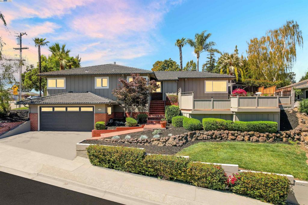 This beautifully updated 3-bedroom, 2-bath home offers 1,655 sq. ft. of modern living space and beautiful views. Step inside to find fresh interior and exterior paint, new luxury vinyl flooring, and tastefully renovated bathrooms. The home is filled with natural light, thanks to the large picture windows that frame the scenic surroundings. Updates include new lighting and fixtures throughout, creating a bright and inviting atmosphere. Enjoy the outdoors with a spacious yard, a newly rebuilt deck, and your private spa—perfect for entertaining or relaxing under the stars. Additional highlights include a two-car attached garage, a dedicated laundry room, and plenty of street parking for guests. Just minutes away from walking trails, parks, and Castro Valley’s conveniences, this home blends comfort, style, and location.