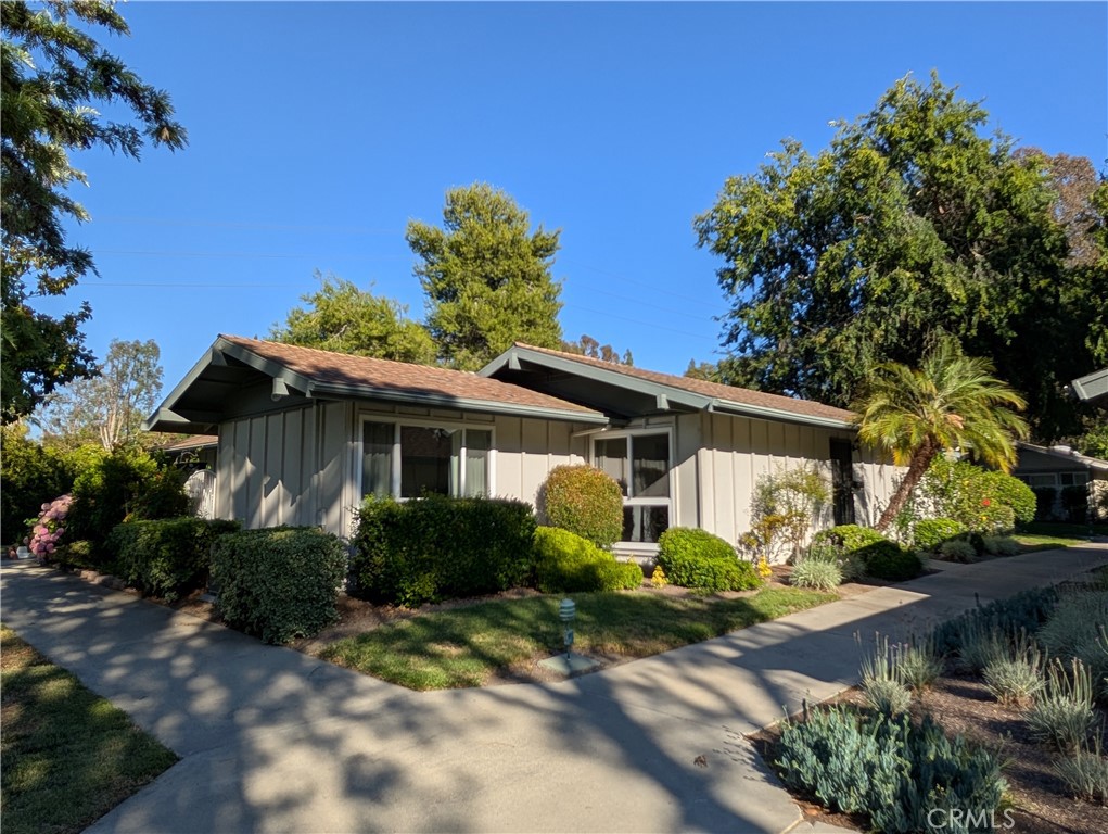 Upgraded single-level San Sebastian model, 2-bedroom, 2-bath end unit with no one above or below. Features an open floor plan, vaulted ceilings, smooth ceilings, dual-pane windows, crown molding, ceiling fans, and wood flooring.
The kitchen has quartz countertops, new appliances, recessed lighting, and bar seating. Opens to a bright living and dining area with access to two private patios for outdoor living. Primary bathroom includes a large walk-in shower. In-unit laundry is located in the hallway closet. Central heat and air installed. Offers excellent privacy with no shared walls in the main living areas.
Located in the 55+ Laguna Woods Village and just ~8 miles from Laguna Beach, this home offers access to an impressive range of community amenities, including a 27-hole championship golf course, a 9-hole executive course, five swimming pools, tennis and pickleball courts, two fitness centers, multiple clubhouses, and over 200 active clubs. Residents can also enjoy an equestrian center, gardening plots, an art studio, and more. The community provides free transportation and 24-hour gated security for added convenience and peace of mind. Carport #475-6. Experience resort-style living in one of Southern California’s premier active adult communities.