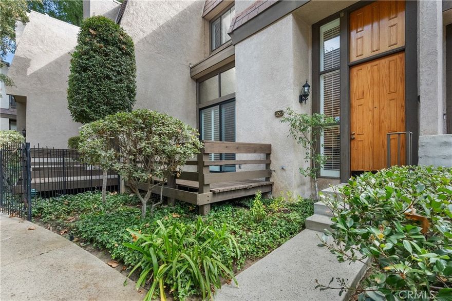 Tucked into a peaceful community where winding streams and mature landscaping create a storybook backdrop, this immaculate tri-level townhome is a rare opportunity, Offered for the first time in almost 40 years, it's more than a home it's a lifestyle of comfort, connection and tranquility. From the front porch, you'll be greeted with a spacious 1,458 sqft floor plan with a dramatic living room featuring a floor to ceiling slider and windows, where natural light streams in and frames views of the garden like grounds. The kitchen and eat in dine is both cozy and functional for everyday meals and the adjoining formal dine is ideal for hosting, celebrating or sharing Sunday dinners. Its a home that easily transitions from quiet moments to lively gatherings. Upstairs you'll find two expansive bedrooms with their own private ensuite bath - providing the ultimate in privacy. Upgraded and Updated features include shutters, recessed lighting, ceiling fans, newer carpet, A/C and water heater. Attached 2 car garage with direct access housing your laundry area and water heater. Conveniently located near CSUN, shopping and public transportation.