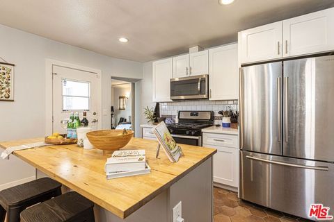 Photo of 1432 W 91ST Street, Los Angeles, CA 90047 (MLS # 26827259)