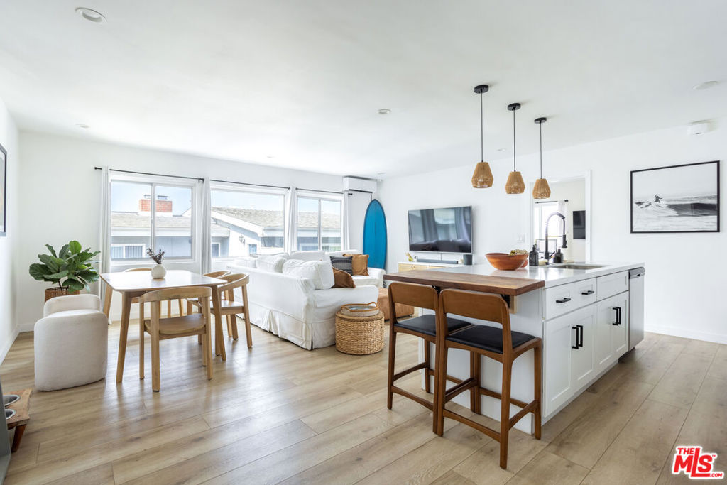 Welcome to 2241 Virginia Ave #11, a top-floor two-bedroom, two-bath condo in a prime Santa Monica location. The unit features brand-new windows, a fully remodeled kitchen with modern cabinetry, quartz countertops, and stainless-steel appliances. The open floor plan brings in plenty of natural light and creates a layout that works well for both everyday living and entertaining. Right outside the unit, you'll find a pool and sun deck, perfect for relaxing or getting some fresh air. There's also a bonus kitchenette sink in the bedroom that can be used as a wet bar, coffee setup, the bonus kitchenette can also offer flexibility to live in one of the bedrooms and rent out the other with total privacy, giving you options to make the space work for your lifestyle. Located close to Whole Foods, close to the beach, restaurants, and shopping, this home puts you in the middle of everything Santa Monica has to offer.