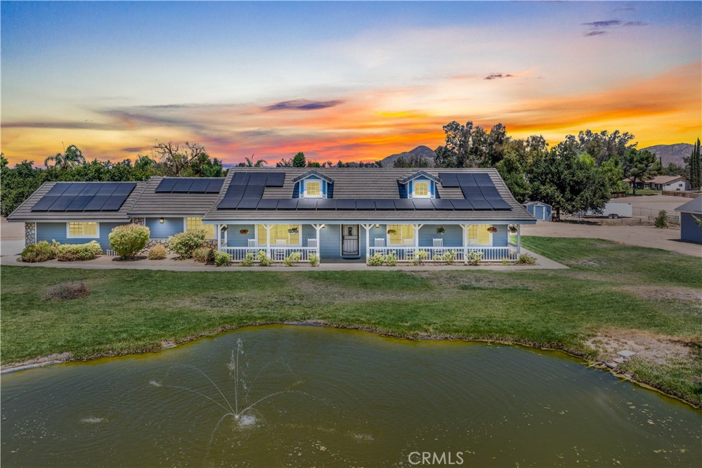 Come explore this charming 3-bedroom, 2-bath RANCH HOME WITH ADU set on 2.5 fully fenced, completely flat, and usable acres.
With well and city water, septic and solar. The main residence offers comfortable living with an open layout, while the property’s features make it truly special. A permitted garage has been professionally converted into a 1-bedroom, 1-bath ADU—ideal for guests, extended family, or rental potential. Two additional storage sheds provide ample room for tools, equipment, or hobbies. Mature trees, a beautiful pond, and wide-open land create a peaceful retreat with plenty of room for all your toys, animals, and future expansion.