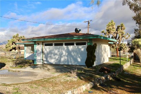 Photo of 57136 Navajo Trail, Yucca Valley, CA 92284 (MLS # JT25137769) Photo of 57136 Navajo Trail, Yucca Valley, CA 92284 (MLS # JT25137769)