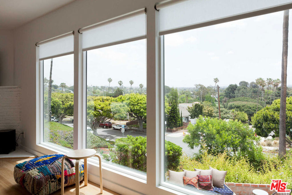 Beautiful elegant designer furnished home. Newly remodeled; modern architecture in the Sunset Park Hills of Santa Monica, featuring spectacular views. Huge windows, very open, and light-filled throughout. New kitchen with very cool styling throughout. Fully furnished and turn-key; three bedrooms plus a studio with separate entrance. Minutes from the golf course, tennis courts, Santa Monica and Venice beach as well as Abbott Kinney and Main Street.