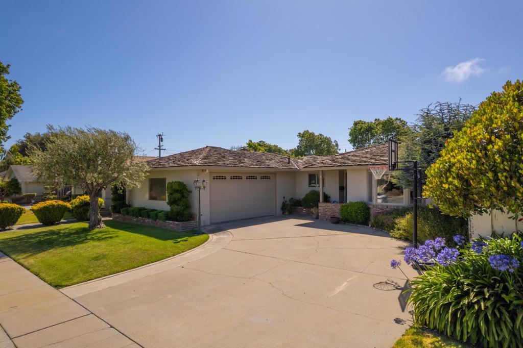 Step into this wonderful Monterey Park residence and you will immediately feel right at home. This darling home is move-in ready and perfect for families with its spacious and efficient layout, filled with natural light, and comfortable living space. The center of the home is the well-designed kitchen that flows naturally into the dining area and family room with large glass walls, inviting gatherings large and small. The formal living room provides another cozy space with a 2nd fireplace and a large bay window. The interior is completed with three bedrooms and two clean, updated bathrooms, plus an extra utility room with indoor laundry and sink. Entertaining can continue in the private backyard that is highlighted with beautiful, mature fruit trees and a paver patio. This rare combination of location and condition create a unique value that is not easily found in the current market environment and should not be missed.