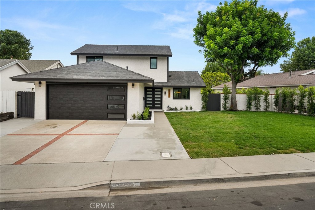 Welcome to your beautifully remodeled home in the heart of Lake Forest! This stunning property boasts an open-concept living and kitchen area, ideal for hosting family gatherings or holiday celebrations. With four spacious bedrooms and two updated bathrooms, comfort and style are at the forefront of the design. Key features include sleek luxury vinyl flooring, modern recessed lighting, and a WiFi-enabled Nest thermostat. The home also offers a spacious driveway and a two-car garage, perfect for storing your vehicles and weekend toys. Located in a prime area, you’ll enjoy easy access to freeways, shopping, local attractions, and dining, offering the best of Lake Forest living. Come see this gem before it's gone!