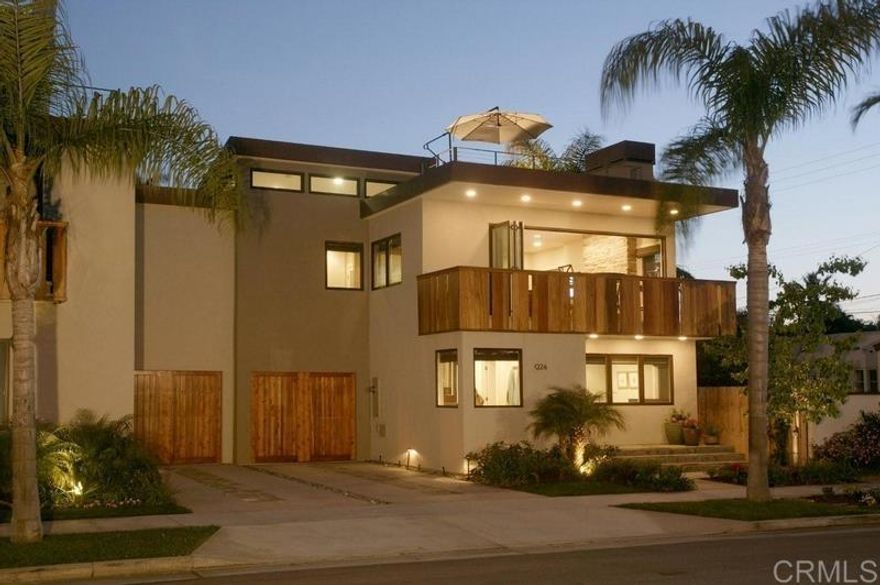 Beautiful, modern 4 Bed|3.5 BA tri-level home, centrally located with a large roof top deck with gas fireplace, gas bbq and refrigerator. Dining table and lounge chairs are strategically placed for best day and night time views of the city skyline and Coronado bridge.  The great room has a disappearing wall of glass that opens to a large balcony. It is perfect for large gatherings. Kitchen, dining and balcony, all have views of the stone fireplace place and television. The kitchen is large and perfect for multiple cooks to prepare their dishes. Appliances include Wolf 6 ring gas stove and oven.  Plenty of seating is available, either at the island, at the dining table, in the club chairs and couch or outside on the balcony.  A second television is in the master bedroom.  Four large bedrooms: 2 with king sized bed, 1 with queen sized bed and 1 with two twin beds. Primary has its own private bathroom. A large Jack and Jill bathroom with dual sinks is available on the first level for the 3rd and 4th bedroom. One car garage with room 5 cruiser bikes for your use.