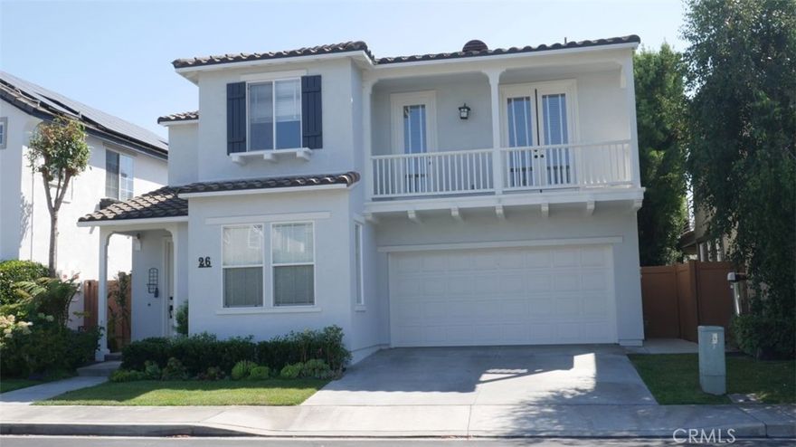 26 Trail Canyon has the panoramic city and hills view rarely available for a home this size, especially one with a downstairs bed and bath. This classic California-Mediterranean 4-bedroom sits on a quiet street in the sought-after Woodlands neighborhood. As you enter, you'll notice the new flooring and recessed lighting throughout the living room and dining room, which has direct access to the view backyard, and opens to the bright kitchen with its large island, white beadboard-style cabinetry, and stainless steel appliances. Upstairs there is a large, separate loft that has spectacular views and is large enough to be used as a family room. The primary bedroom shares the expansive views and has an en suite bathroom with a double sink vanity, separate tub and shower, and an extra-large walk-in closet. Completing the upstairs are two more secondary bedrooms, a full bath, and a convenient laundry area. The view is visible from the backyard decorated with beautiful pavers and a stacked-stone garden wall. 26 Trail Canyon is located in Woodlands, a small community of homes that are part of the upscale Westridge community, which includes Westridge Park, and is walking distance to highly rated Canyon Vista Elementary and a 5-minute drive to the Aliso Viejo Town Center and the 73 toll road.