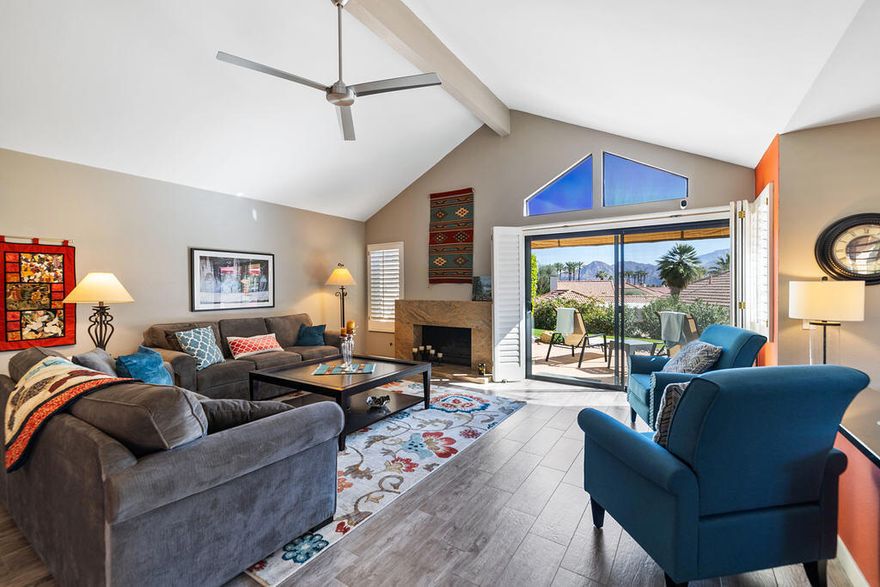 This is your chance to own a stunning home at an unbeatable price!  Stunning Mountain Views!!  Remodeled & fully furnished! 2 Bedroom * 2 Bathroom + Den (with hide-a-bed), 1705sf., free-standing ''end unit'' features the highly sought after Plan B layout with direct garage access. Enjoy breathtaking south & west facing mountain views from the elevated patio. A private Courtyard leads to a second spacious patio, also boasting stunning mountain vistas. Every detail of this home has been thoughtfully upgraded for modern comfort & style. A spacious living room with fireplace, a dedicated dining area, & a versatile step-down Den/TV room.  The Atrium floods the interior with natural light incorporating greenery to enhance ventilation & tranquility, creating an inviting airy space. The fully renovated Kitchen is designed for both style & functionality, soft-close cabinetry, SS appliances, pull-outs, under cabinet lighting, wine cooler, charming breakfast nook & more. Primary bedroom is a luxurious en suite, new Cal King bed/mattress, built-in dresser, lots of closet space, TV. Spacious 2nd Bedroom has a new Queen bed/mattress for ultimate comfort. Both bedrooms & Den are fitted with plush new carpeting, otherwise tiled throughout.  With a choice of three nearby pools, this home is truly move-in ready, outstanding Rental opportunity, permanent or seasonal home. A must see to appreciate all it has to offer. Silver Sands RC includes 15 pool/spas, fitness facility, pickle ball, tennis courts.