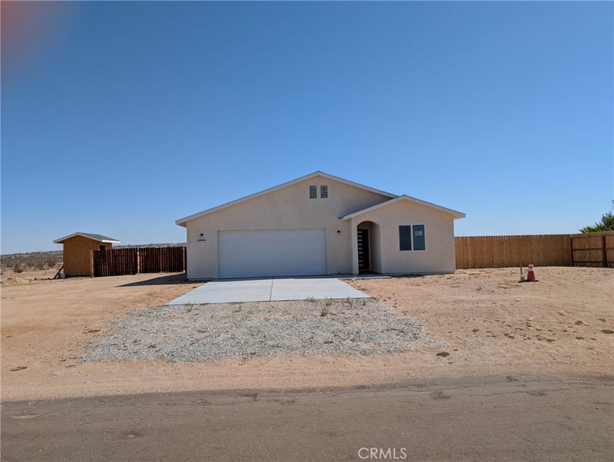 Welcome to this stunning brand new home located at 9878 Magnolia Ave in California city. This beautiful property boasts 3 bedrooms and 2 bathrooms, with a spacious floor plan that is perfect for modern living. with a living space of 1364 sq ft, this home offers plenty of room for relaxation and entertainment. situated on a massive lot of 2.39 acres, offers privacy and room to roam. The kitchen features granite countertops and modern appliances, perfect for the home chef. The solar system is paid off, providing energy efficiency and cost saving for the homeowner. Don't miss your chance to own this exquisite property in California City. With its brand construction, spacious layout, and energy efficient upgrades, this home is sure to impress. schedule a showing today and make this your dream home!