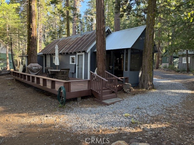 Escape to the cool, crisp air of Butte Meadows with this charming and historic 1-bedroom, 1-bath rustic cabin nestled among the tall pines. Enjoy stunning views of open meadows and the soothing sounds of a nearby flowing creek — the perfect getaway from Chico’s hot summers. Ideal for hiking, backpacking, and in winter, snowshoeing , this cabin offers year-round adventure. Step out onto the spacious deck to soak in the natural beauty, or cozy up inside — the cabin comes completely furnished and ready to enjoy. Set on rare BLM land, ownership includes a 99-year lease, making this one of the few unique opportunities to own a piece of mountain serenity in this special area. Whether you're seeking a weekend retreat or a base for four-season recreation, this is a true hidden gem waiting to be discovered Rare property don't own land but only the Cabin which is located on BLM land . Grandfathers in from the 1900's. you have a long term lease ownership of land only and you can sell the cabin when ever you wish but the land belongs to BLM. Call agent for details