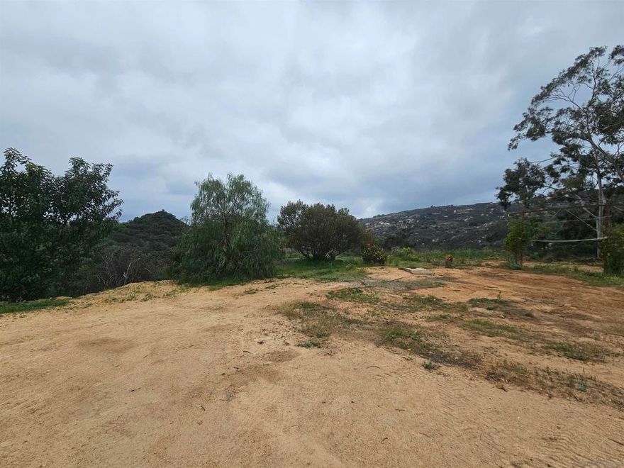 NEW PRICE & FINANCING NOW AVAILABLE!!! 40+ Acres in beautiful & secluded Rainbow Heights with amazing views all around & primed for an avocado or citrus grove, agricultural, ranch or your own private get-a-way. Working well onsite surrounded by a few pads, hiking trails, beautiful Sycamore & Oaks with numerous huge decorative boulders all around. Private graded road all the way to the property & surrounded by only a handful of neighbors homes.