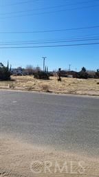 Corner lot ready for your vision. Located in central area of city, which allows for options for building.