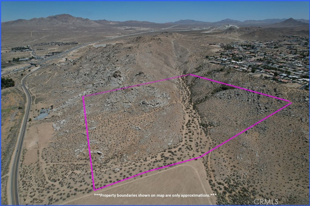 Large Residential Lot, 40 Acres (APN: 0478-061-07) GPS: 34.544761, -117.28478 This lot is located within the city limits of Victorville, CA. The city has zoned the property as Single Family Residential (R-1). This zoning district is intended to protect established neighborhoods of single-family dwellings and to provide space for suitable locations for additional developments of this kind, with appropriate community facilities. The city allows up to five dwelling units per gross residential acre (7,200 st ft lots). According to Victorville Water District, a water line runs along Stoddard Wells Rd (approx. 300 ft west of the property). Overhead power lines also run along Stoddard Wells Rd approx. 230 ft west of the property. This parcel does not have access to Stoddard Wells Rd and would require an easement. Located in the High Desert region of San Bernardino County, Victorville has a prime location along Interstate 15, making it a convenient hub for commuters to cities like Los Angeles and Las Vegas. The city's affordable housing market and growing economy—bolstered by new developments, shopping centers, and local businesses—make it appealing for both first-time buyers and investors. The development of the Brightline high-speed train, connecting Southern California to Las Vegas, is set to be a major boost for the area. With a planned station in the Victor Valley, this modern transportation link will drastically reduce travel time between the two destinations, making it a convenient choice for both commuters and tourists. The train is expected to bring increased economic activity to the area, attract new businesses, and raise property values. While the boundary lines on the map offer a glimpse, they are only approximate. A Buyer should verify boundaries, zoning and utilities, ensuring every aspect aligns with their vision for the property.