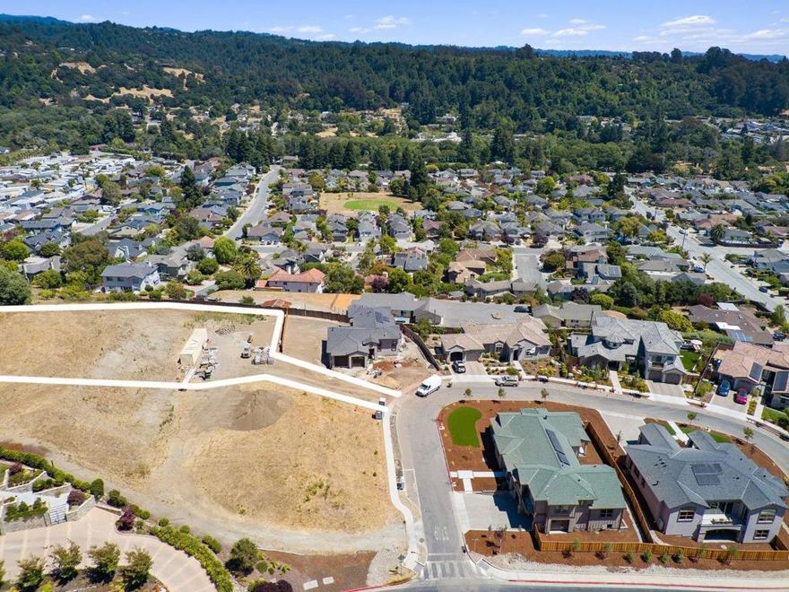 Last Prime Ocean View Lot available. The original developer reserved the most coveted ocean view lots for themselves, now it's available to build your dream home. This lot is the largest in the prestigious 9-home development, perched above the others to offer unparalleled, expansive Valley & Ocean views. The plans for a stunning 4-bedroom, 4-bathroom, 2,846 sq ft home with an attached 2-car garage have already been approved! If you're looking for a different vision, redesigned plans are available to view. The approved design maximizes the breathtaking scenery, with the main living areas situated on the ground floor. The layout includes a great room, formal dining room, and a spacious kitchen that opens to a casual dining area/family room. The main level also features a guest bedroom and a luxurious primary suite with a large walk-in closet & a beautifully appointed bath offering both valley and ocean views. The lower level is designed for relaxation, with two additional bedrooms, two baths, and another family room that opens to a covered veranda, perfect for enjoying the serene surroundings. A great location for Silicon Valley commuters, offering an alternate route to escape from Hwy 1 traffic. A close distance to Soquel & Capitola Villages, local parks, schools & the beach.