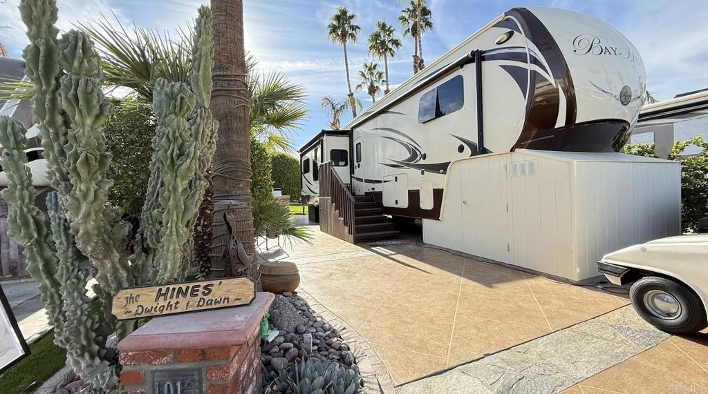 Lot 1013, On the small back nine has a north south orientation providing afternoon shade as you prepare dinner at the outdoor kitchen. Outdoor Resort Palm Springs (ORPS) is a Guard Gated 5-Star RV Resort Community offering an active and luxurious lifestyle featuring golf (27 holes), tennis, pickleball, swimming and more! Two clubhouses, fitness center, beauty solan, La Roma Restaurant on campus, dog park and more!