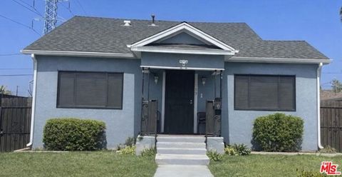 Photo of 10518 Stanford Avenue, Los Angeles, CA 90002 (MLS # 26669827)