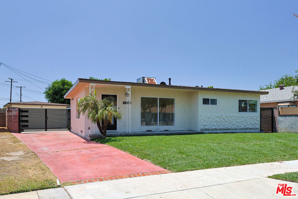 Welcome to this beautifully remodeled 3-bedroom, 1-bathroom home in Norwalk! Step inside to discover brand new flooring throughout and great natural lighting throughout. The kitchen has been fully updated with sleek new appliances. The renovated bathroom features modern finishes. Outside, enjoy a spacious backyard complete with a detached two-car garage and a custom outdoor bar area ideal for weekend BBQs, or hosting friends. This home blends indoor comfort with outdoor living and is move-in ready for its next owner. Don't miss this fantastic opportunity to own a stylish and functional home in a great neighborhood!