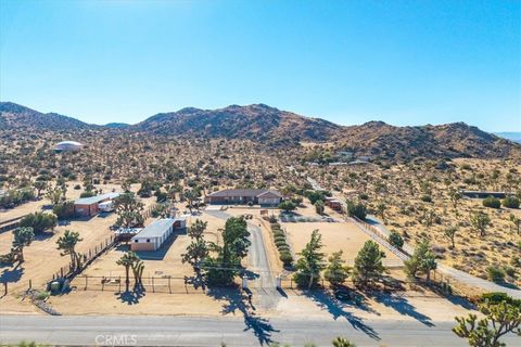 Photo of 9588 Black Rock, Yucca Valley, CA 92284 (MLS # TR25200920) Photo of 9588 Black Rock, Yucca Valley, CA 92284 (MLS # TR25200920)